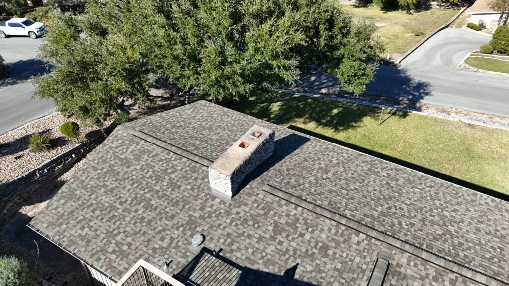 Architectural shingles recently installed on a roof in Lakeway Texas