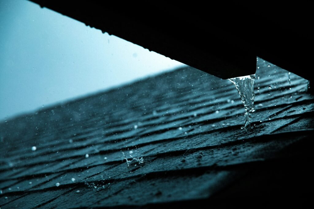 Round Rock hail damage represented with a close-up photo of hail on a roof