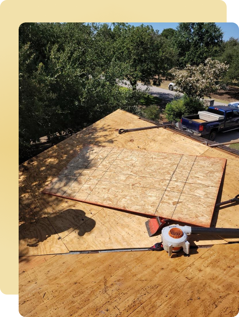 Plywood roof deck being completed by crew before sealing and installing Class 4 impact resistant shingles by Impact Resistant Roofing + Renovation